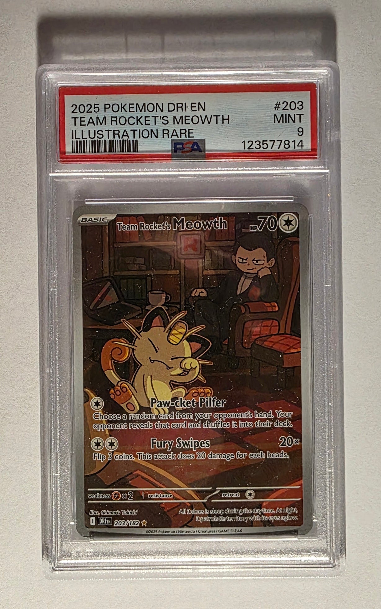 Team Rocket’s Meowth 203/182 Illustration Rare PSA 9 – 2025 Pokémon Card